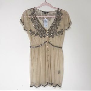 Buckle Embroidered Mesh Top